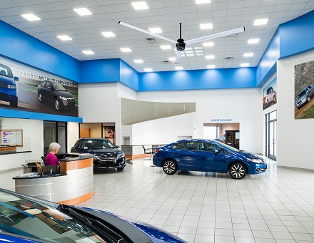 HVLS fan in an auto dealership showroom