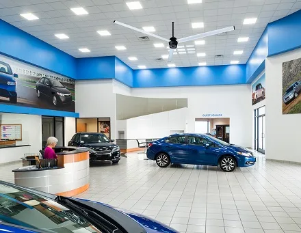 HVLS fan in an auto dealership showroom
